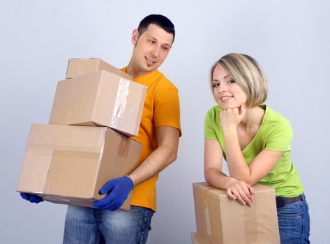 Household items being loaded into a removals vehicle