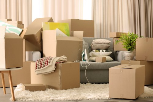 Professional movers loading a van in Stjohnswood