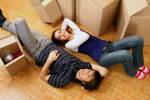 Packing boxes and furniture for a move in Stjohnswood